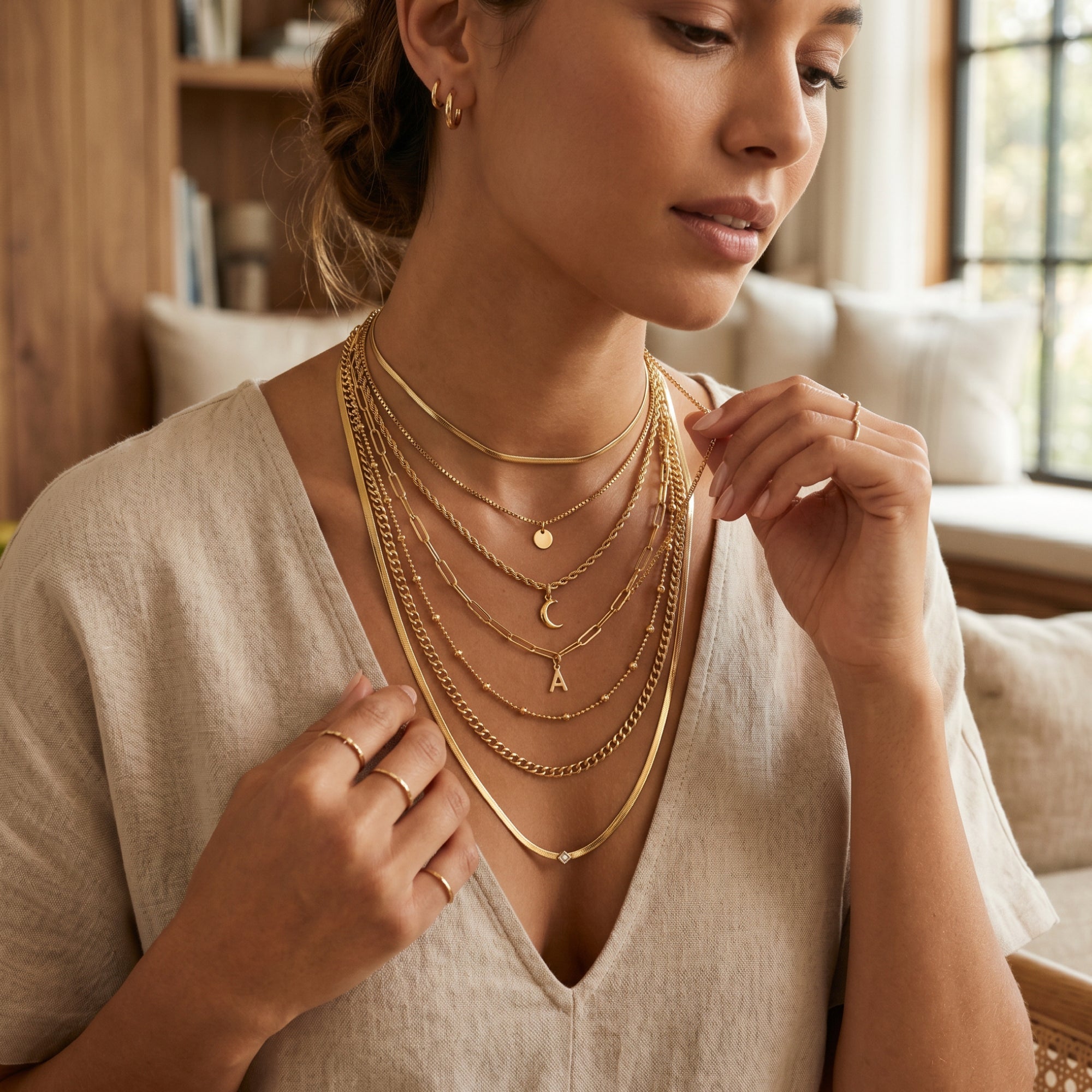 How to Master the Art of the Neck Mess: Layering Gold Chains