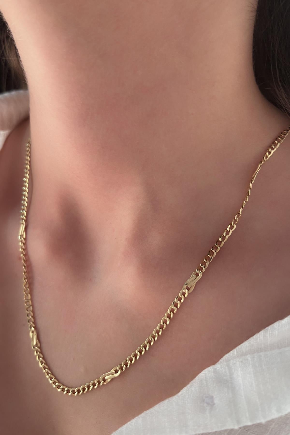 14K Gold Bow Tie Cuban Link Chain 0.118 inch