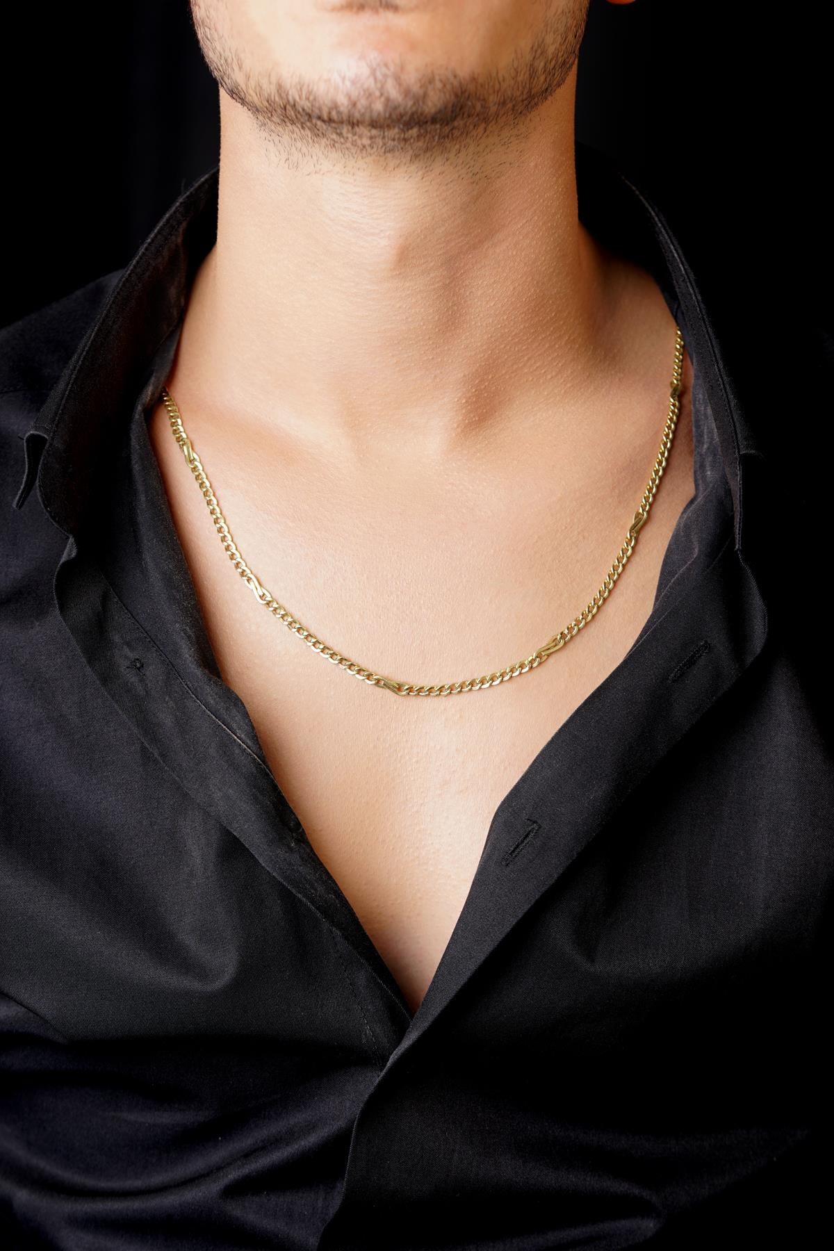 14K Gold Bow Tie Cuban Link Chain 0.153 inch