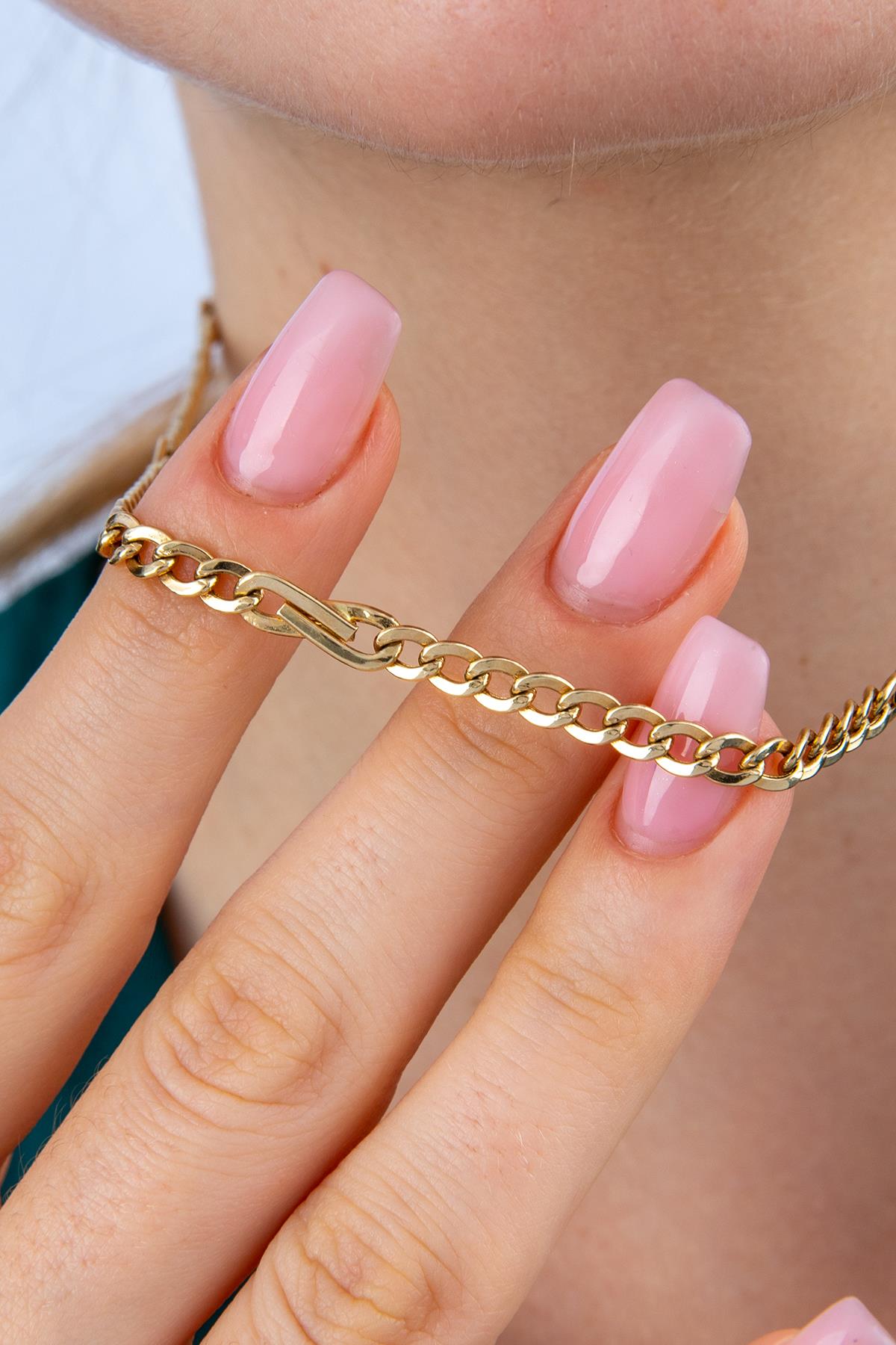 14K Gold Bow Tie Cuban Link Chain 0.153 inch