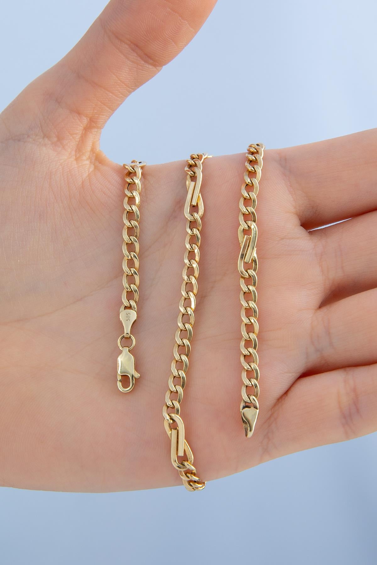 14K Gold Bow Tie Cuban Link Chain 0.153 inch