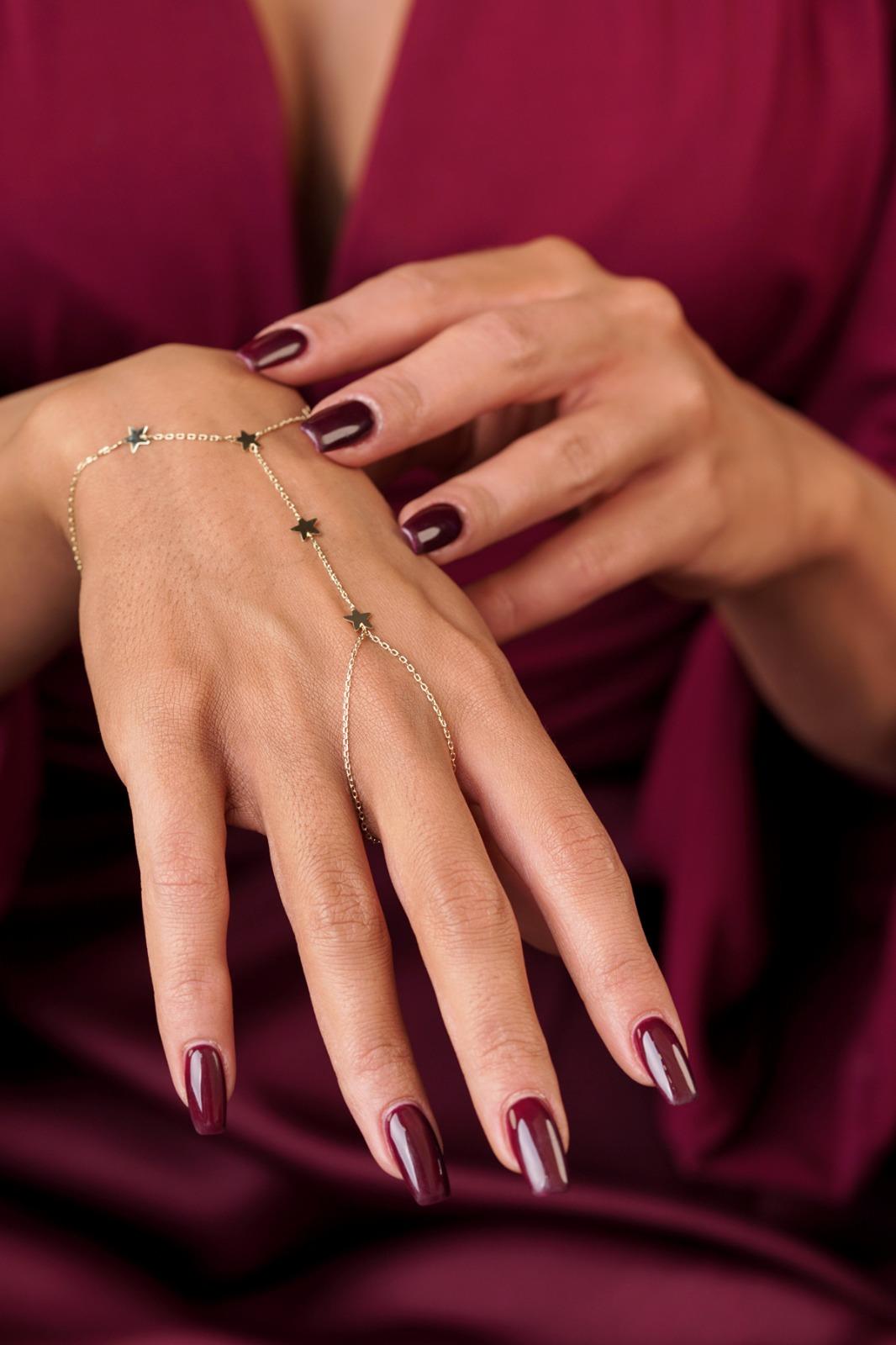 14K Gold Row of Stars Hand Chain