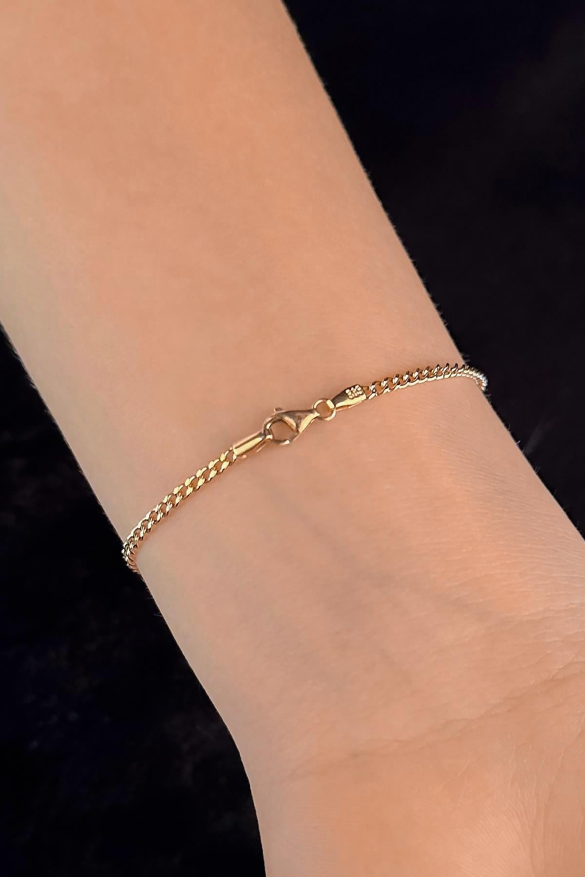14K Gold Saw Bracelet With White Stone