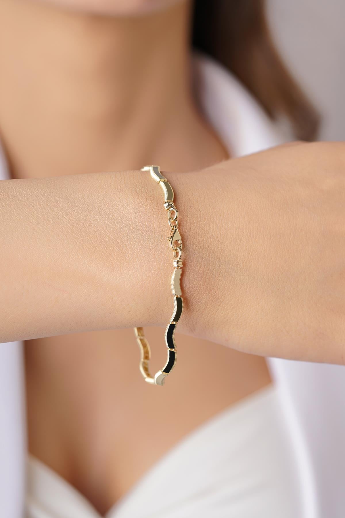 14K Solid Gold Wavy High-Polish Bangle
