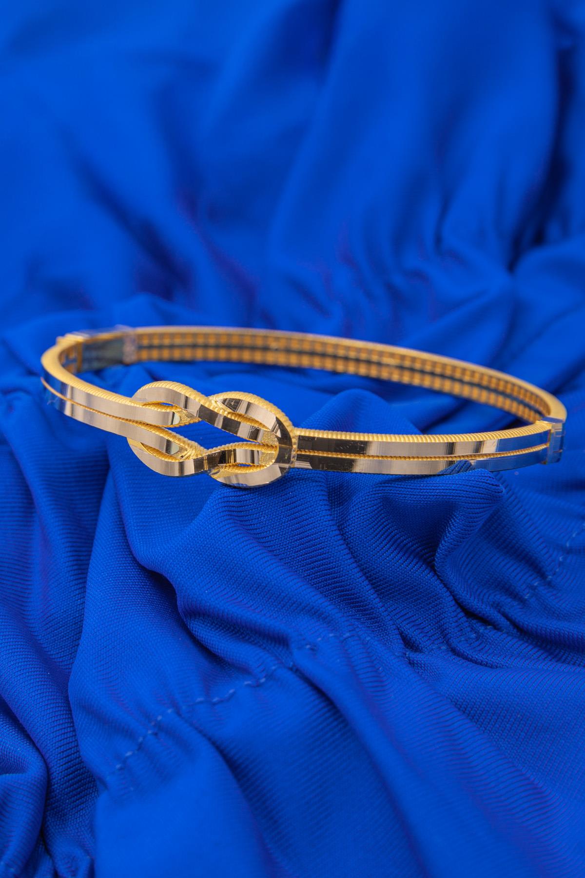 14 K Gold Gleaming Two Tone Love Knot Bangle