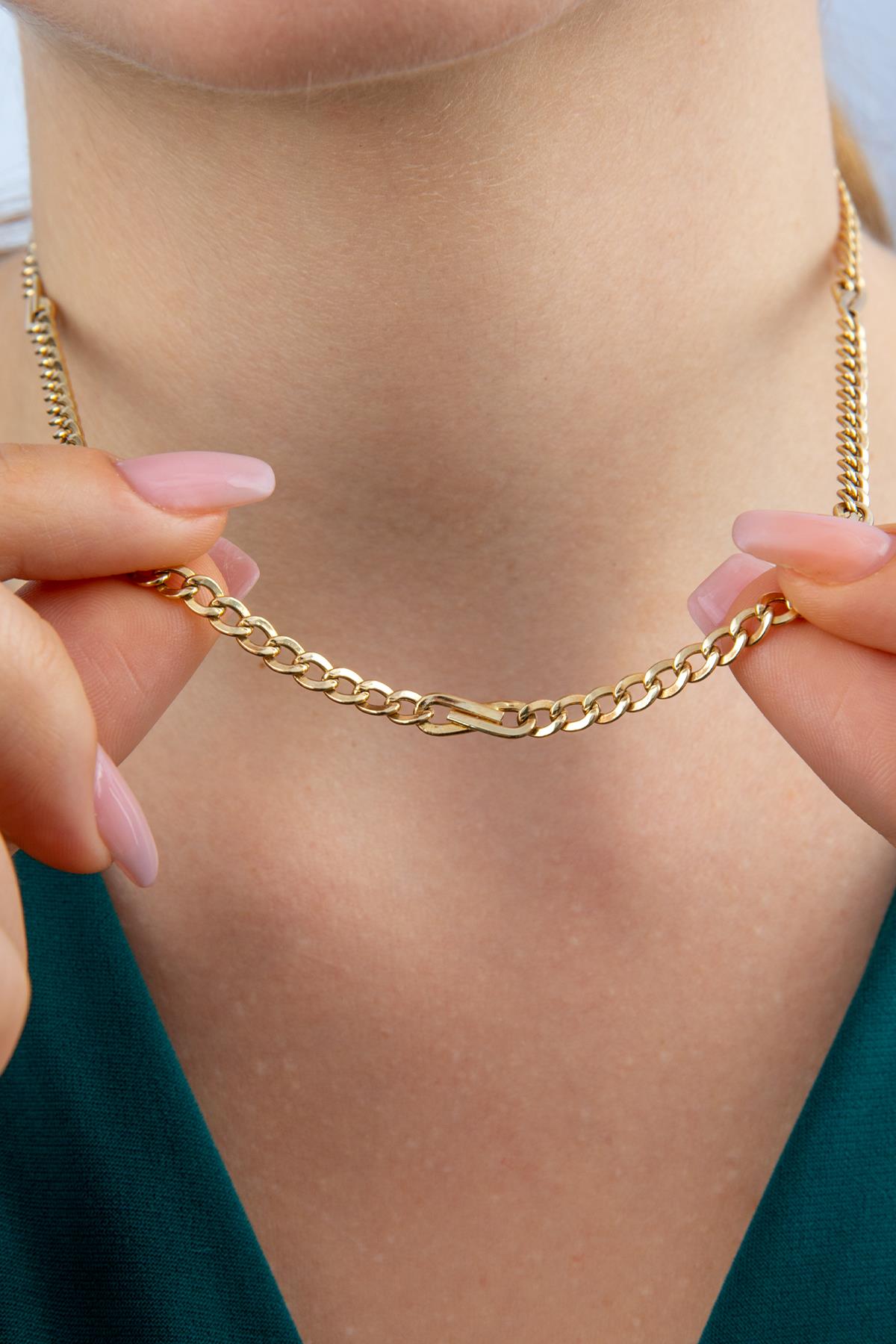 14K Gold Bow Tie Cuban Link Chain   0.153 inch