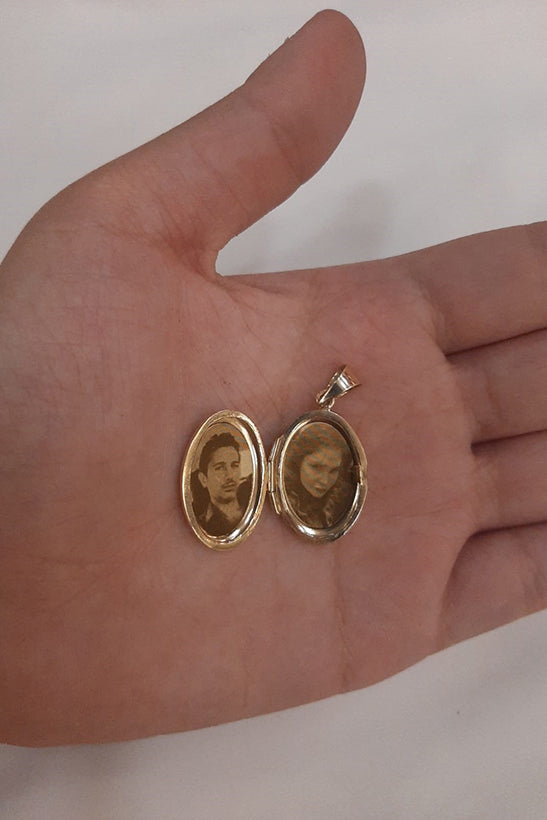 14K Gold Oval Charm With Open And Possible Picture