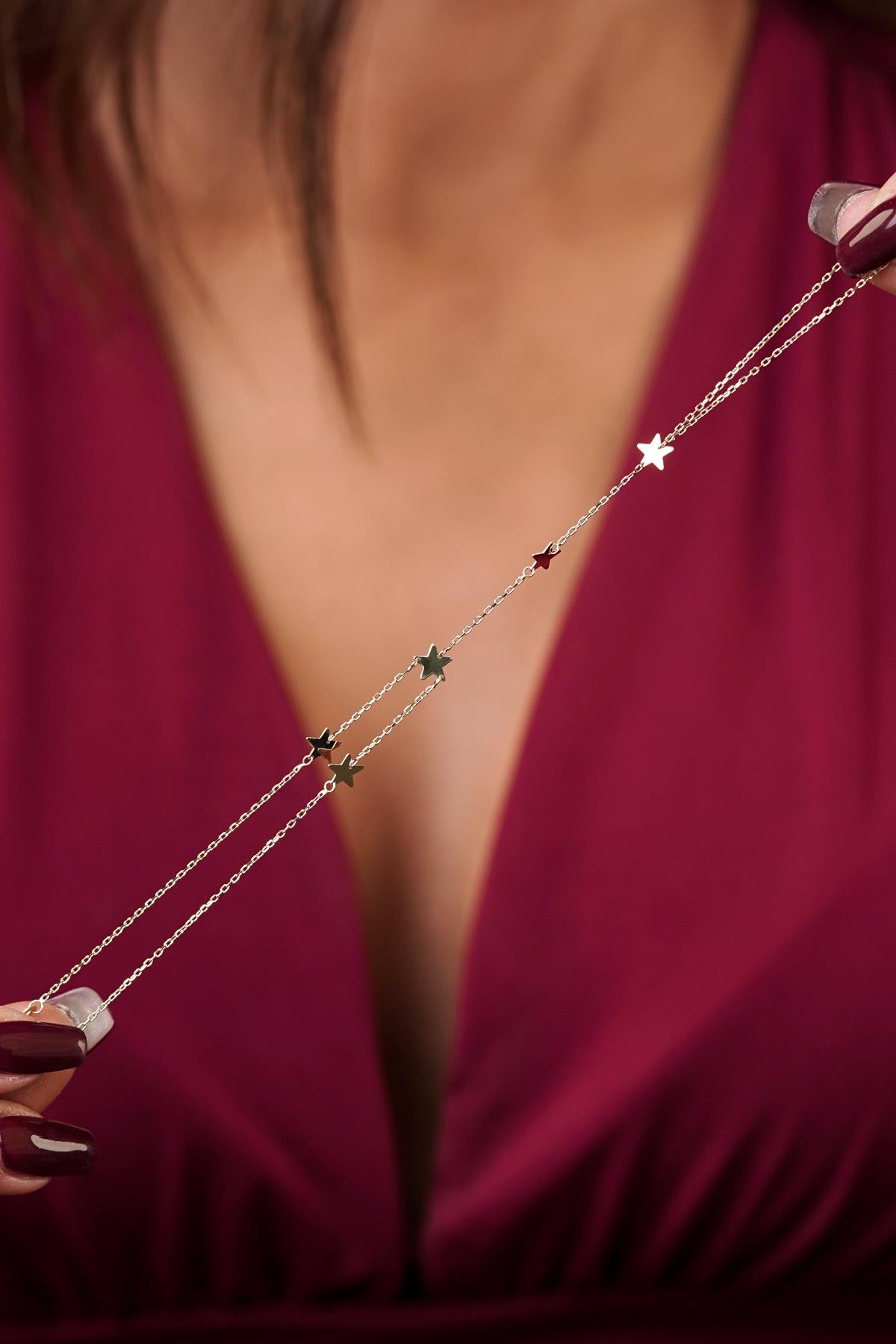 14K Gold Row of Stars Hand Chain