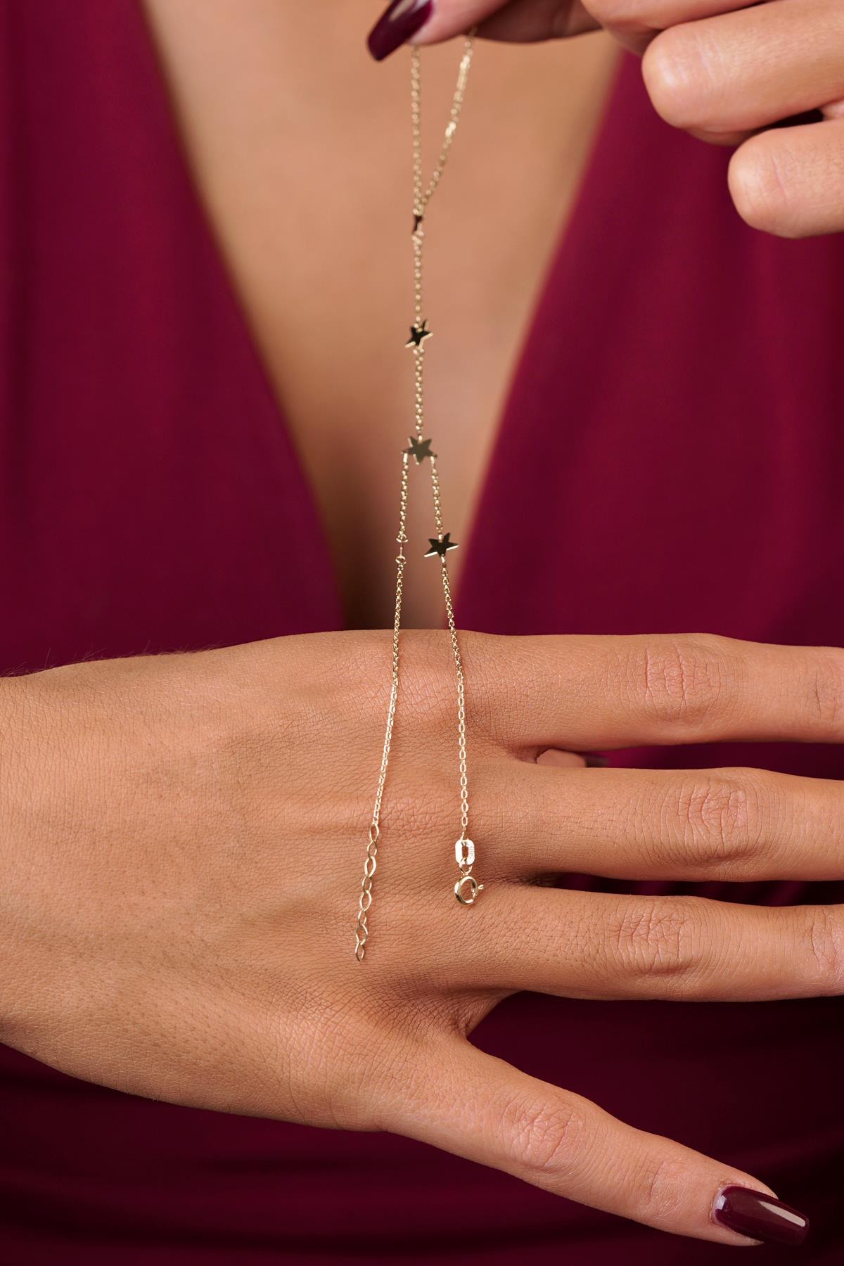 14K Gold Row of Stars Hand Chain