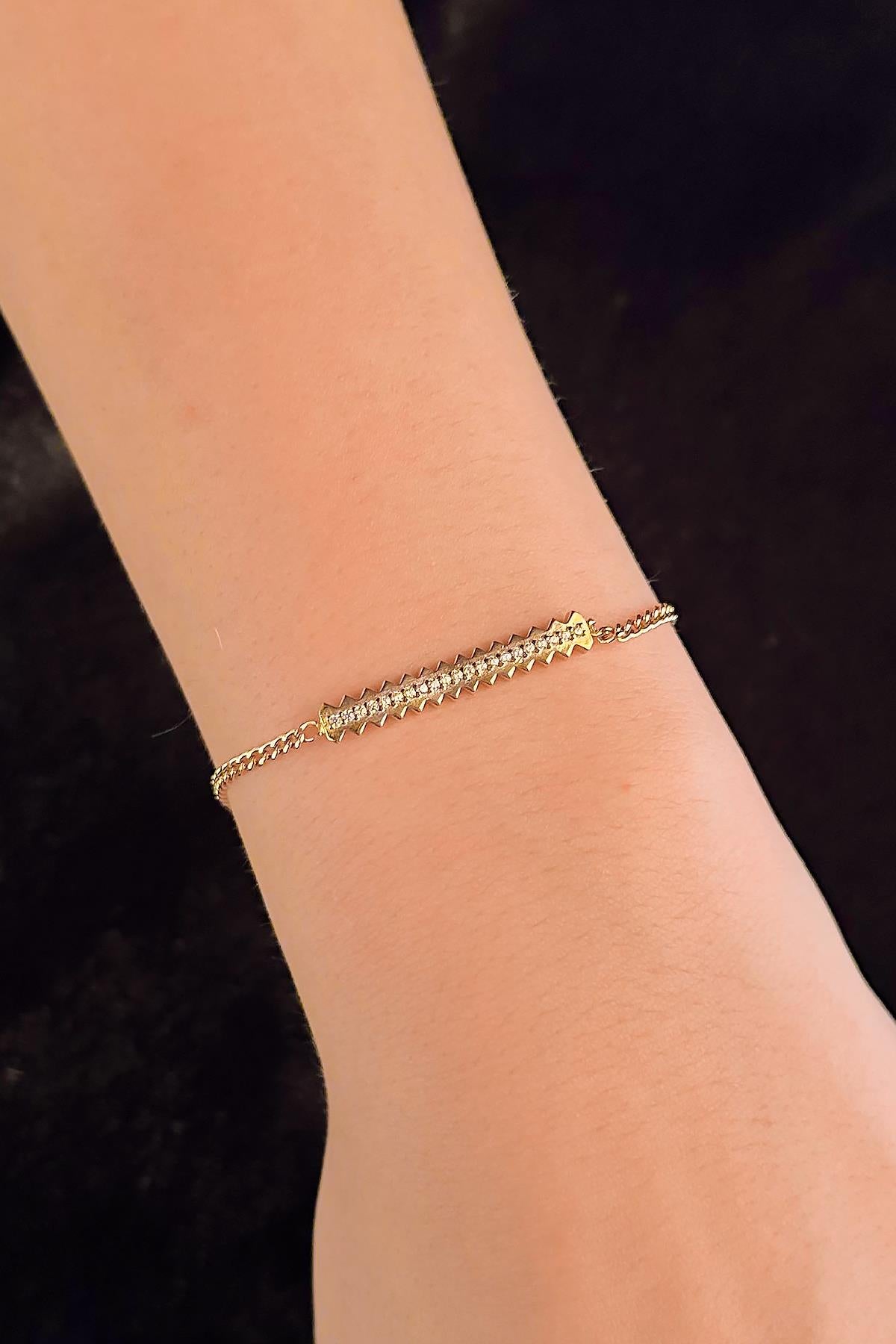 14K Gold Saw Bracelet With White Stone