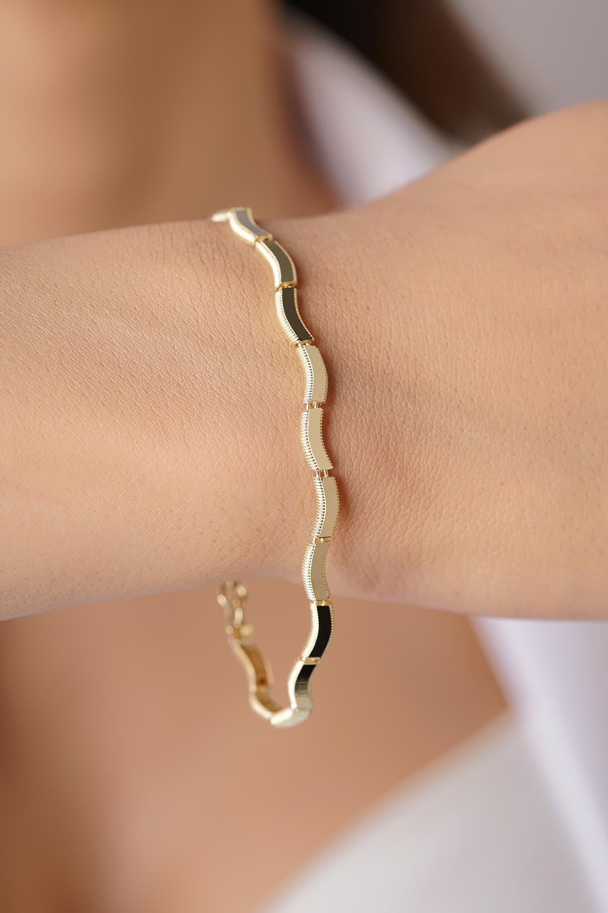 14K Solid Gold Wavy High-Polish Bangle